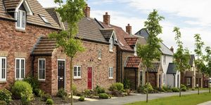 recently built brick houses of traditional design on a housing development in northern england