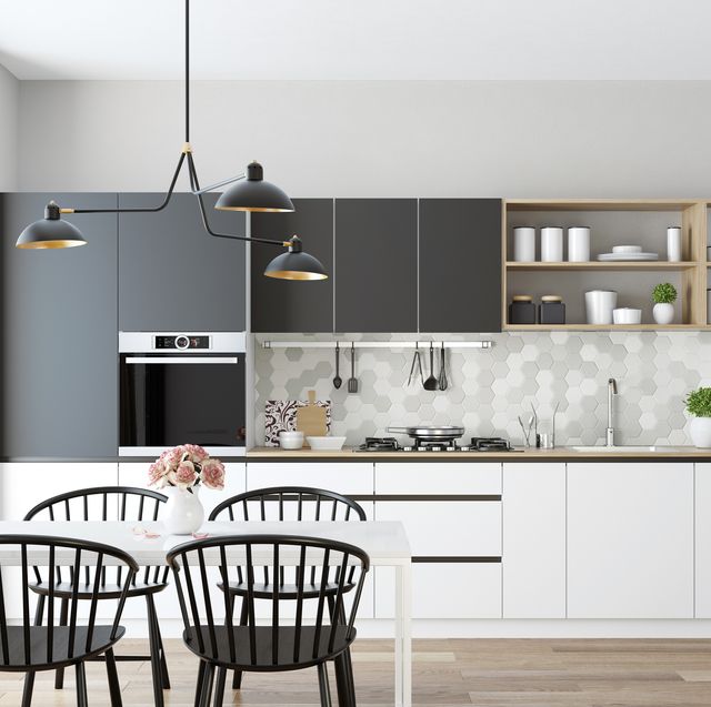 https://hips.hearstapps.com/hmg-prod/images/modern-scandinavian-kitchen-and-dining-room-royalty-free-image-1678136745.jpg?crop=0.628xw:1.00xh;0.0714xw,0&resize=640:*