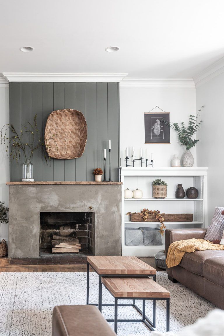 green planked walls above fireplace
