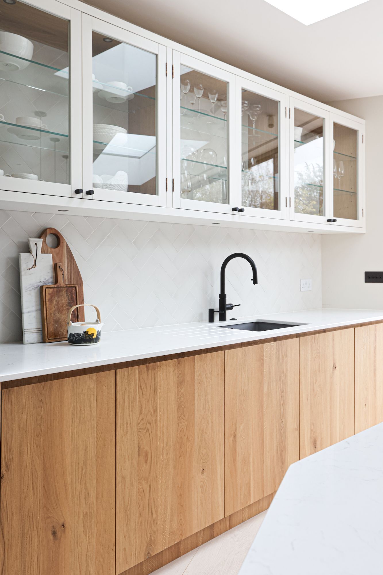 Coffee Mug In Modern Trendy Kitchen With Grey Cupboards And Wood