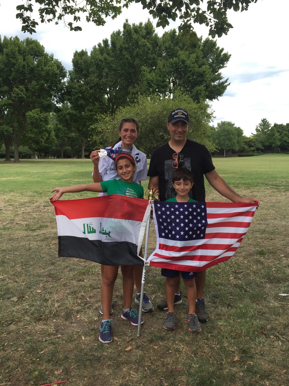 mais back left with her husband, mohammed back right, her daughter, meena front left, and her son, mejd front right at the finish of mais’s first triathlons﻿