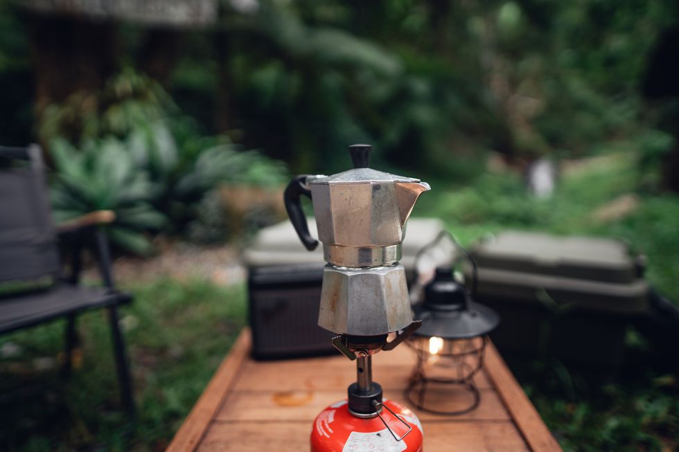 moka pot coffee on outdoor camping table
