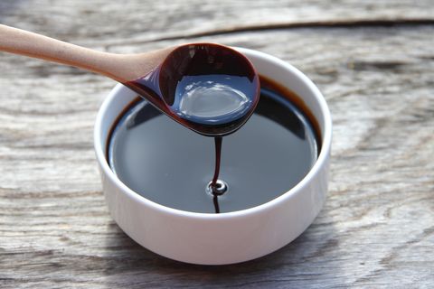 molasses that remains as a residue from the crystallization of cane sugar and is used as food and rum production