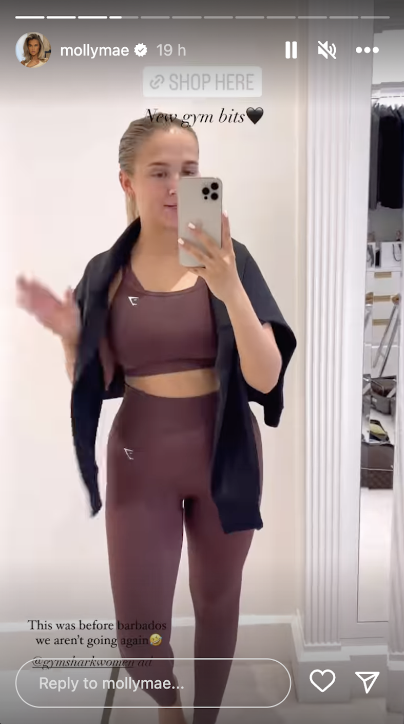 a screengrab of molly mae hagues instagram stories where she is wearing a set from gymshark in a maroon colour