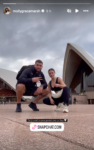 zach and molly posing in front of sydney's opera house