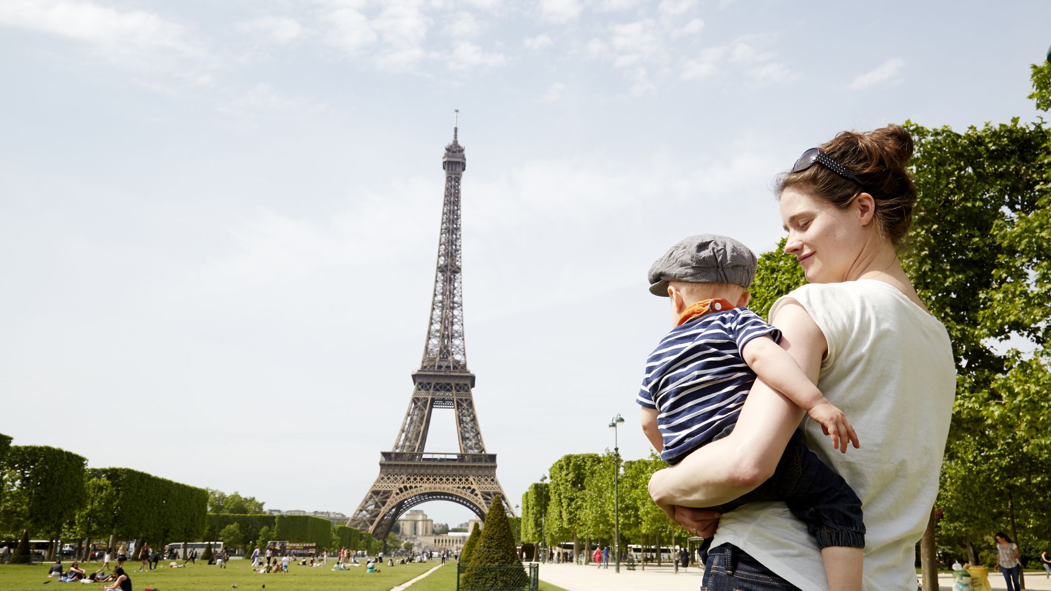 https://hips.hearstapps.com/hmg-prod/images/mom-and-baby-in-front-of-eiffel-tower-in-paris-royalty-free-image-1687458181.jpg?crop=1xw:0.84375xh;center,top