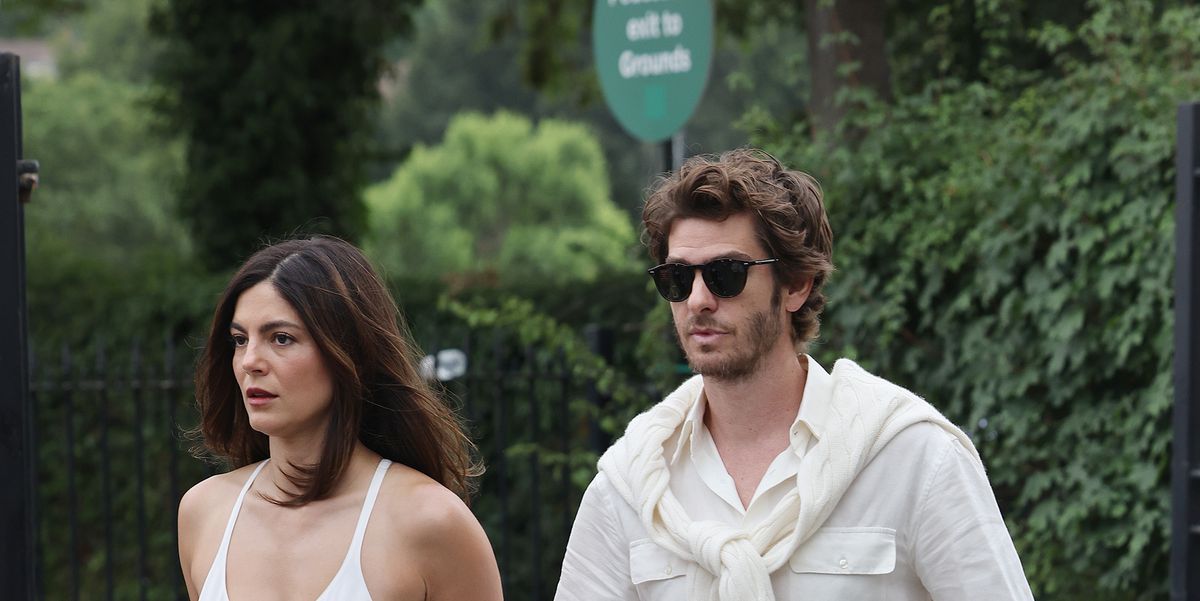Monica Barbaro and Andrew Garfield Serve a Preppy Courtside Look in Coordinated Whites