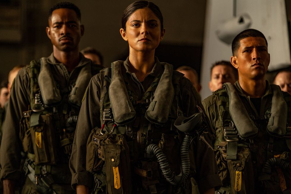 monica barbaro plays "phoenix," jay ellis plays "payback," and danny ramirez plays "fanboy" in top gun maverick from paramount pictures, skydance and jerry bruckheimer films