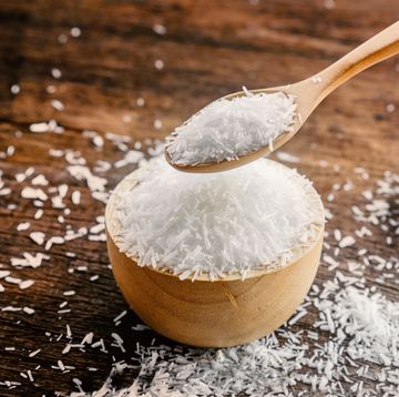 monosodium glutamate (msg) or seasoning ,gourmet powder on wooden table