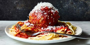 large meatballs covered in red sauce