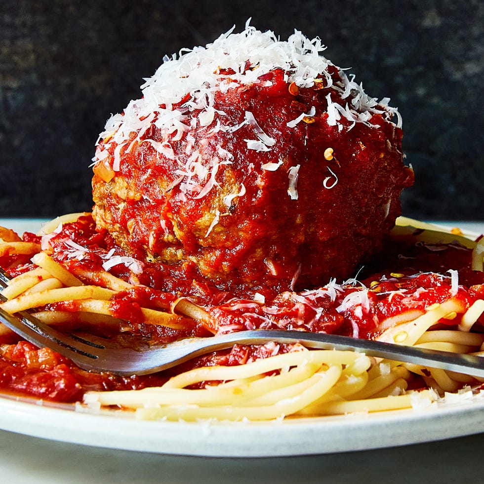 large meatballs covered in red sauce