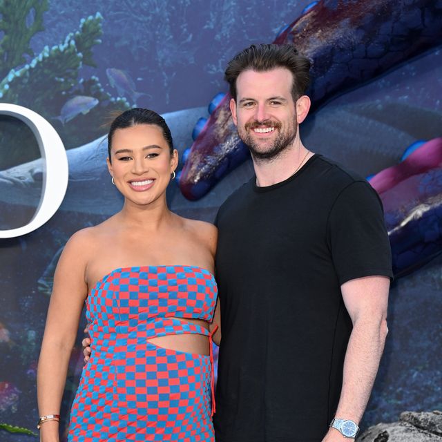 a heavily pregnant montana brown and her fiancé mark oconnor at the premiere of the little mermaid