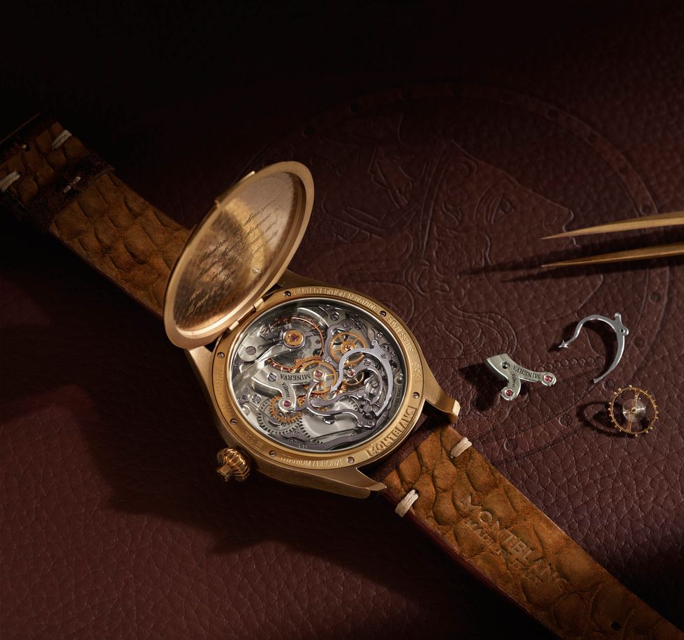 the watch features a hinged caseback made of bronze coated titanium