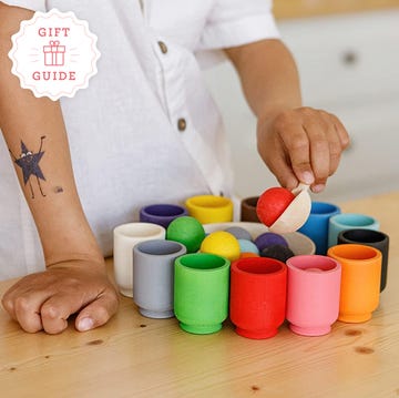 the color sorting cups and a wobble board are two good housekeeping picks for best montessori toys for 1 year olds