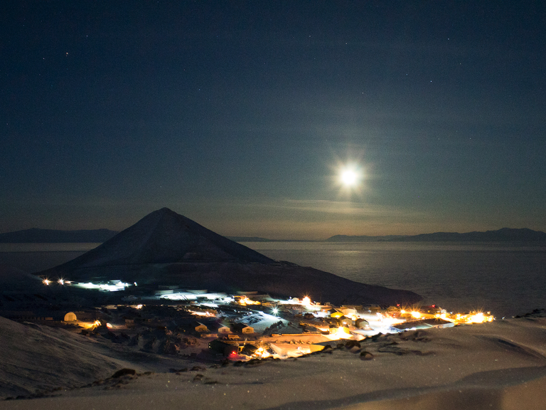 moon over mcmurdo station in june 2014 by andrew smith