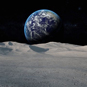 moon surface with distant earth and starfield