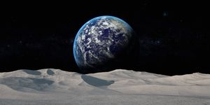moon surface with distant earth and starfield