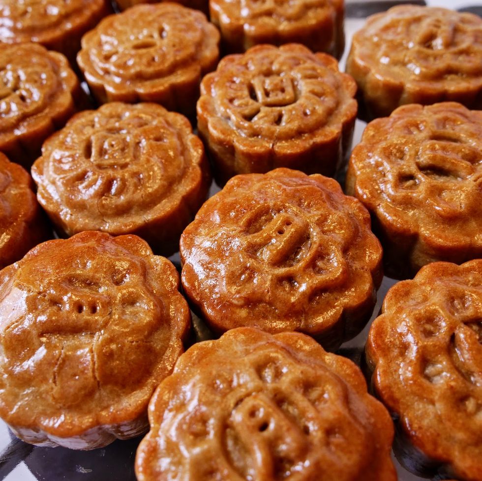 homemade mooncakes with shiny egg wash