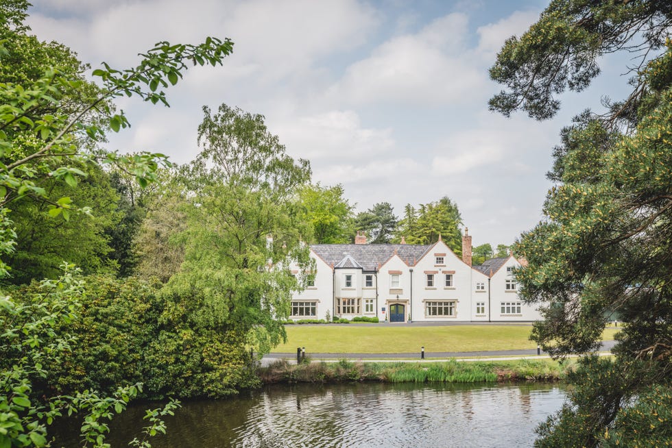 moor hall exterior view across lake