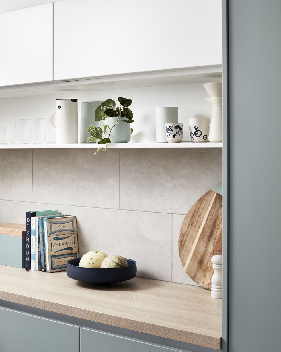 https://hips.hearstapps.com/hmg-prod/images/moores-x-house-beautiful-islington-ice-blue-kitchen-at-homebase-1675208800.jpg?crop=1xw:0.9333333333333333xh;center,top&resize=980:*