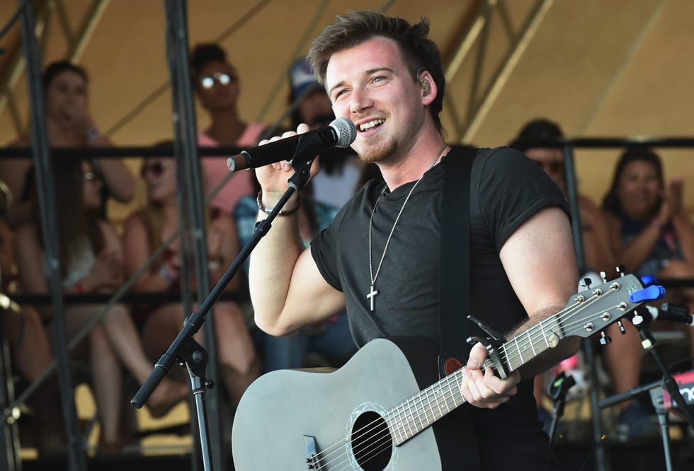 morgan wallen singing and playing guitar