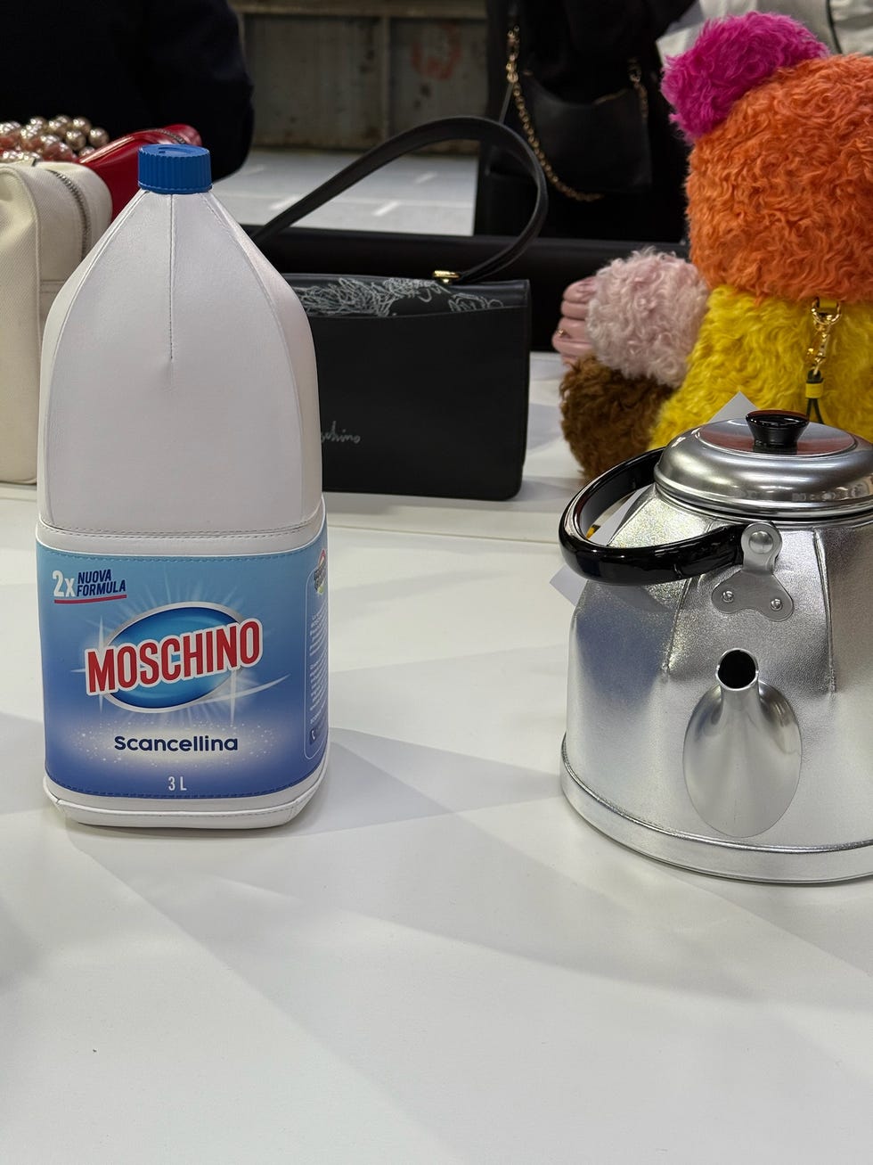 moschino's faux clorox and coffee pot