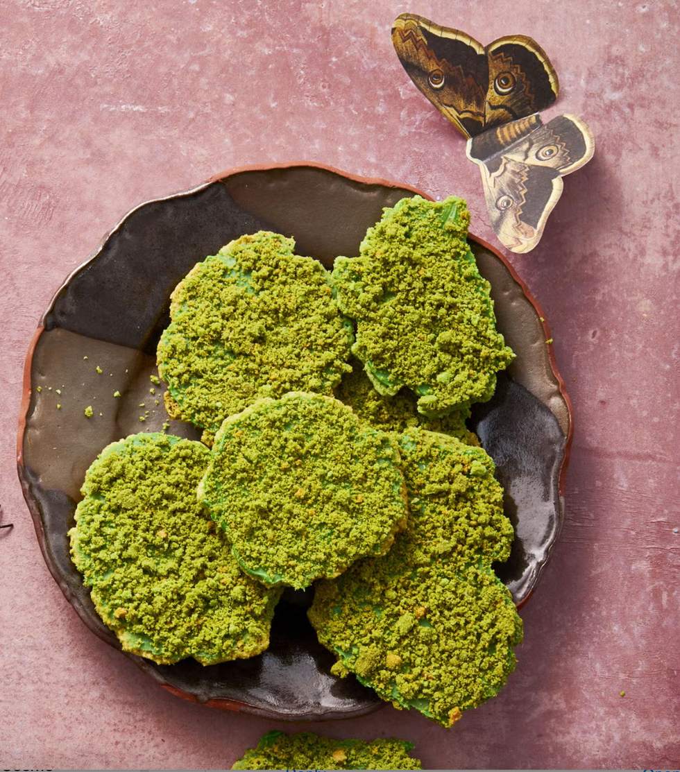 plate of moss cookies covered with cookie crumbs