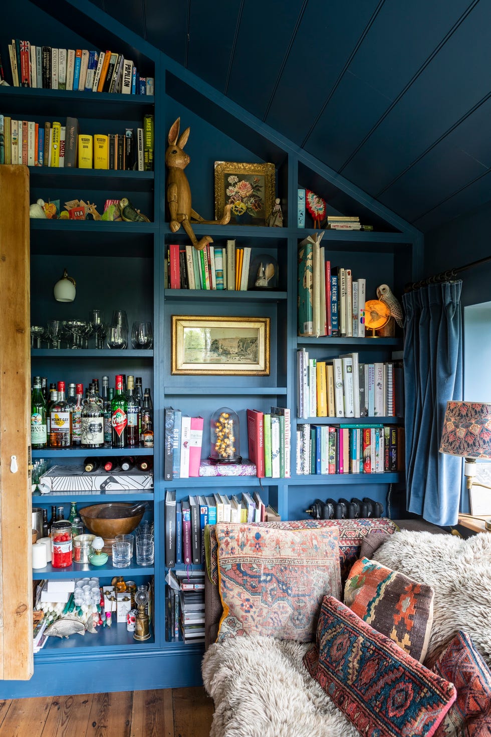 Navy blue shelves in the living room