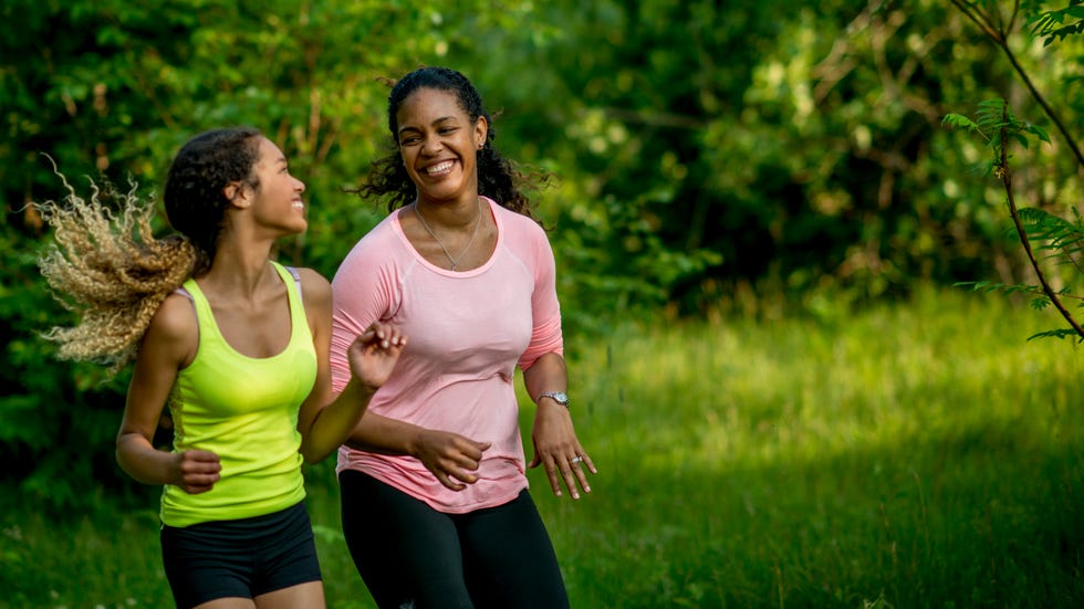 Mother and Daughter Exercising