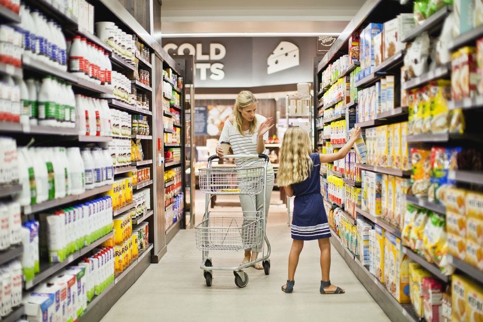 mother and daughter in grocery store