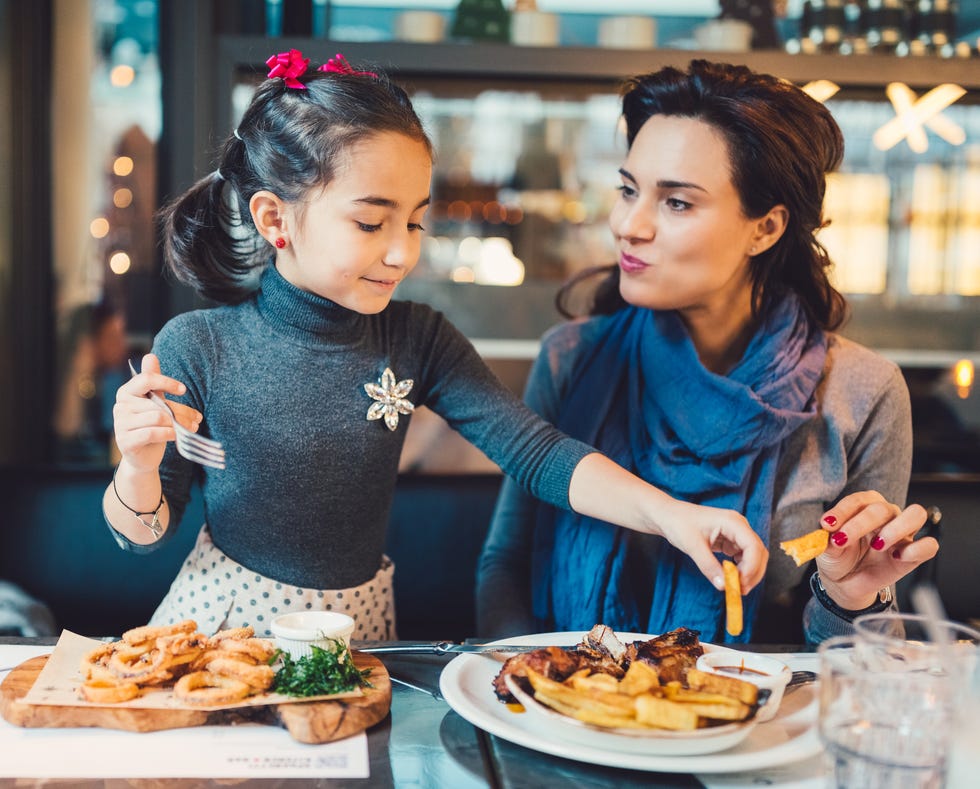 https://hips.hearstapps.com/hmg-prod/images/mother-and-daughter-in-restaurant-royalty-free-image-862345352-1551902227.jpg?crop=1xw:1xh;center,top&resize=980:*