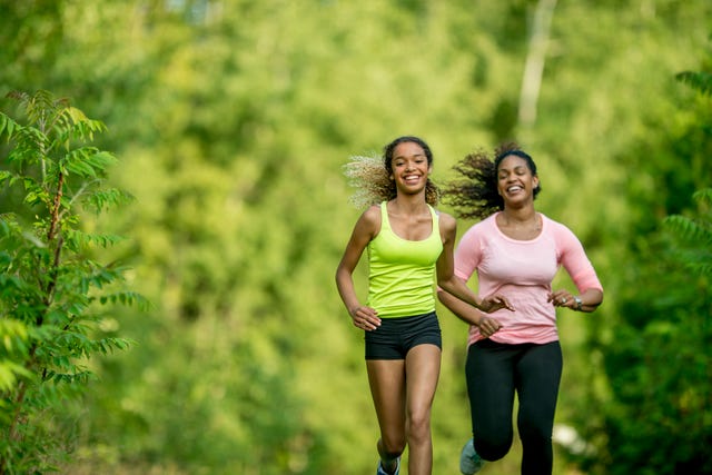 mother and daughter running together