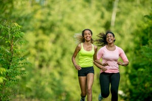 mother and daughter running together