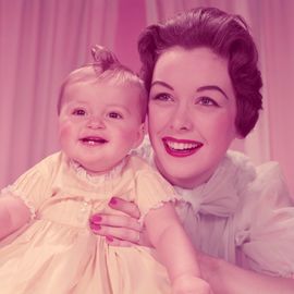 mother and daughter smiling, portrait. (photo by h. armstrong roberts/retrofile/getty images)
