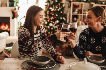 mother and daughter wine toasting