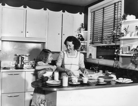 mother daughter at the kitchen counter