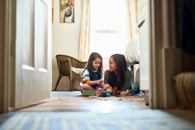 Mother playing with daughter