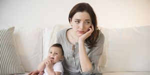Mother with new baby suffering from postpartum depression