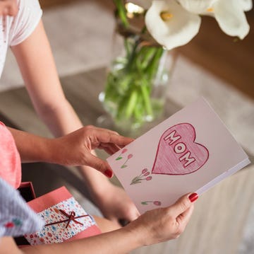 family reading mothers day card together