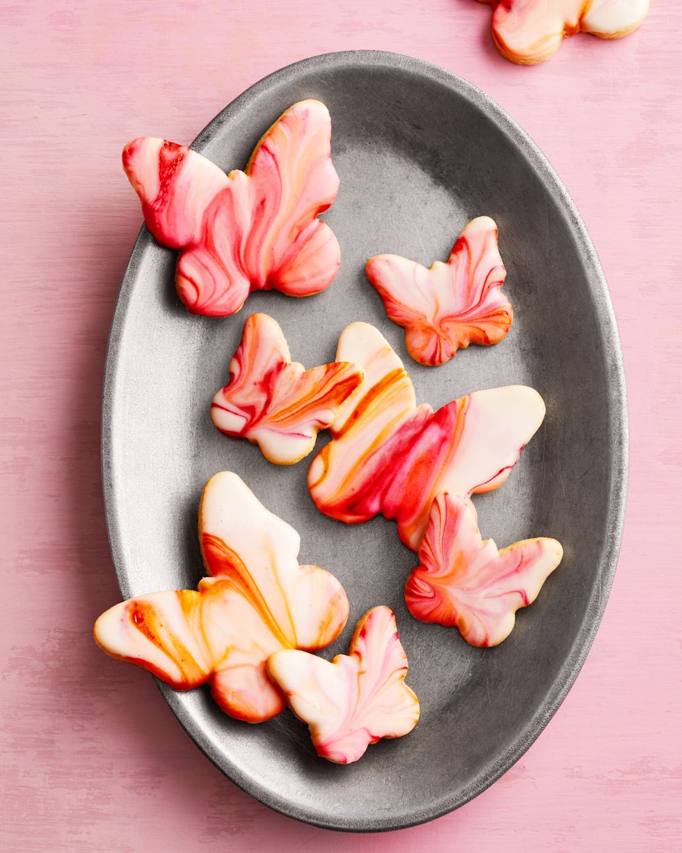 mothers day cookies like butterfly sugar cookies on a metal plate
