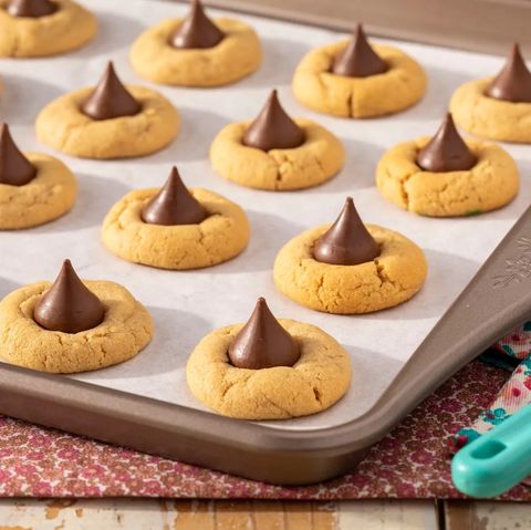 peanut butter blossom cookies on sheet pan