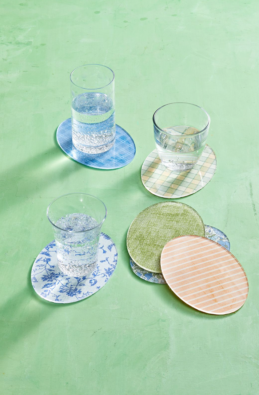 mothers day crafts for kids, egg shaped coasters wrapped in fabric with glasses on top
