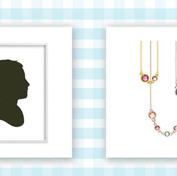 silhouette art of child in frame and birthstone necklaces