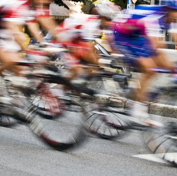 motion blur of bicycle race riders color image