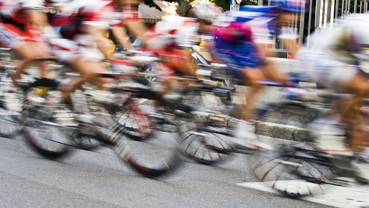 motion blur of bicycle race riders color image