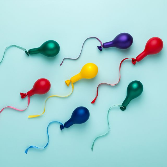 Motion of Colorful balloons in spermatozoid shape concept.