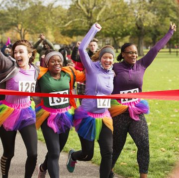 motivational bible verses four women running through the finish line