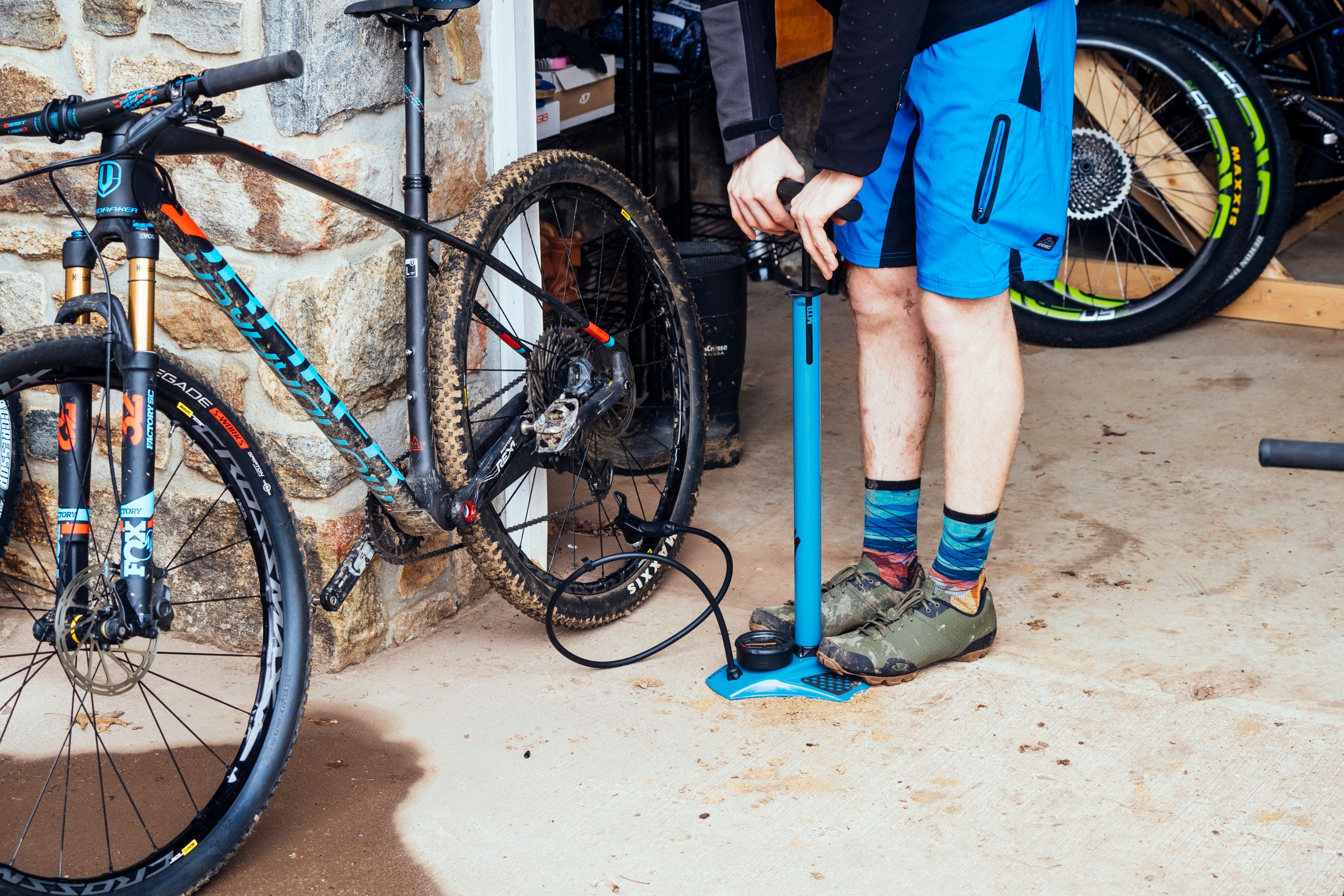 pumping up a racing bike tyre