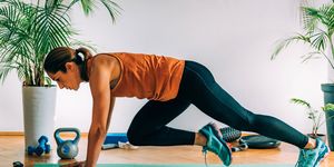 mountain climbers, woman exercising indoors, hiit or high intensity interval training