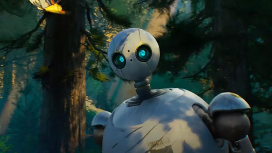 a robot explores the woods in a scene from the wild robot, a good housekeeping pick for best movies for kids 2024